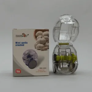 Moledor de ajos compacto con caja de presentación, ideal para cocina práctica en el hogar peruano